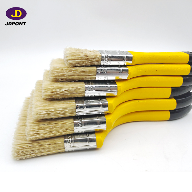 Yellow wooden handle bristle filament paintbrush for most of